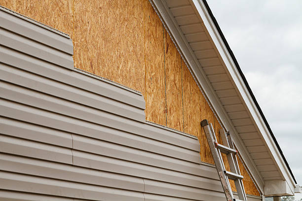 Professional Emergency Siding Repair technician working in Manitou Springs, CO